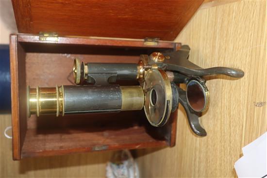 A cased brass microscope